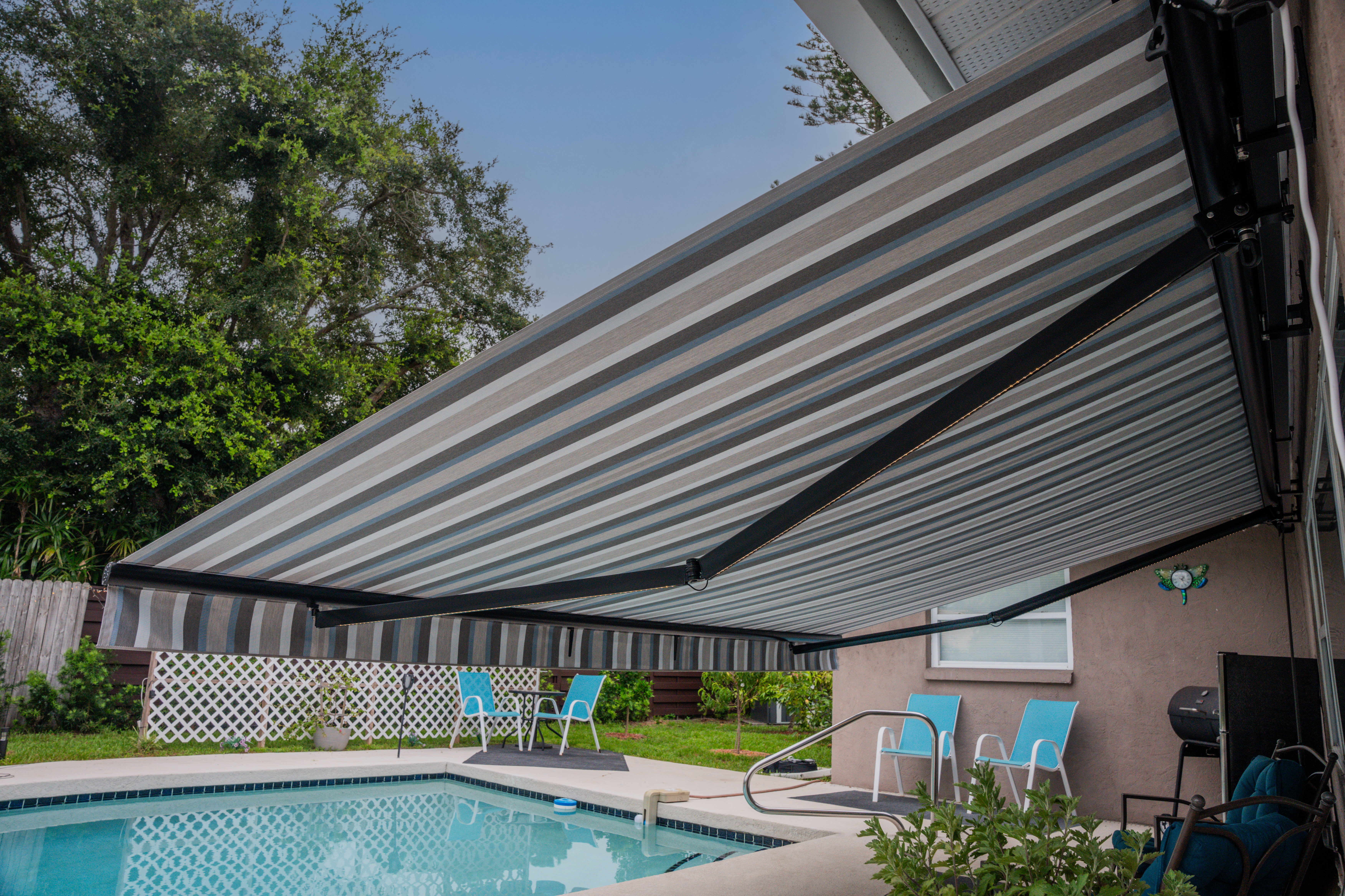 Awning-Residential-LEDLights-TanStucco-MarcoBlueGrey-Pool