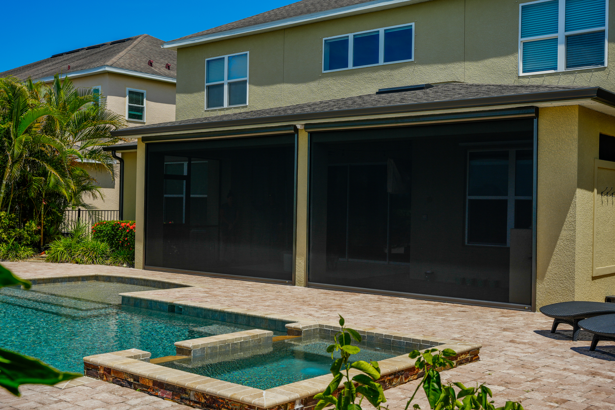 Screens-Residential-Exterior-Multiple-BronzeHousing-Stucco-Pool