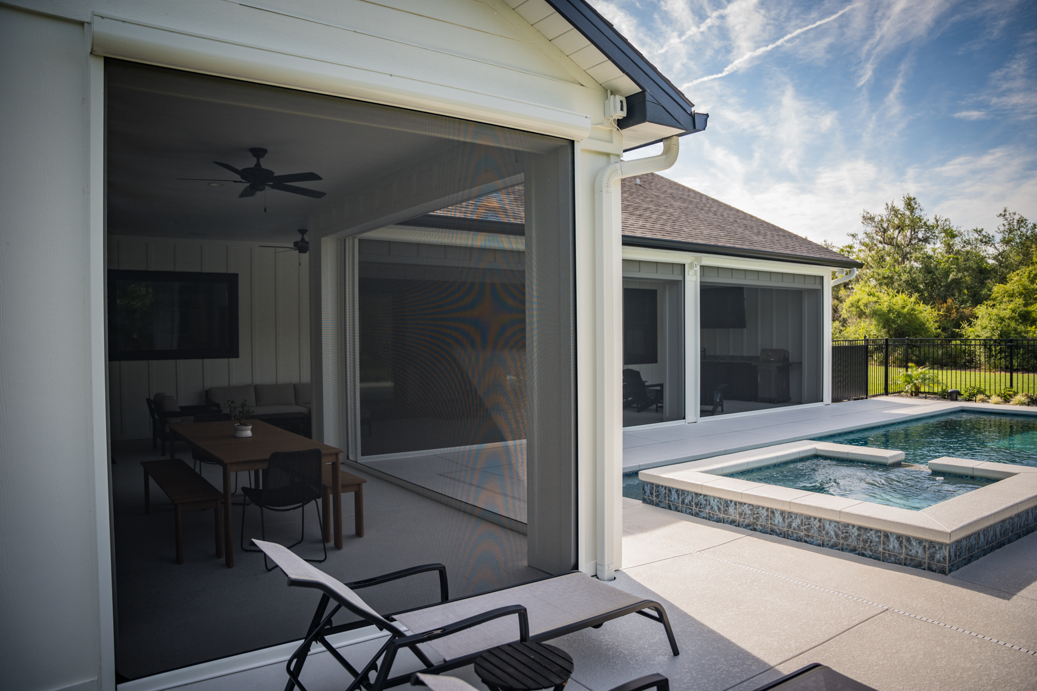 Screens-Residential-Exterior-Multiple-WhiteFrame-Pool-VerticalSiding