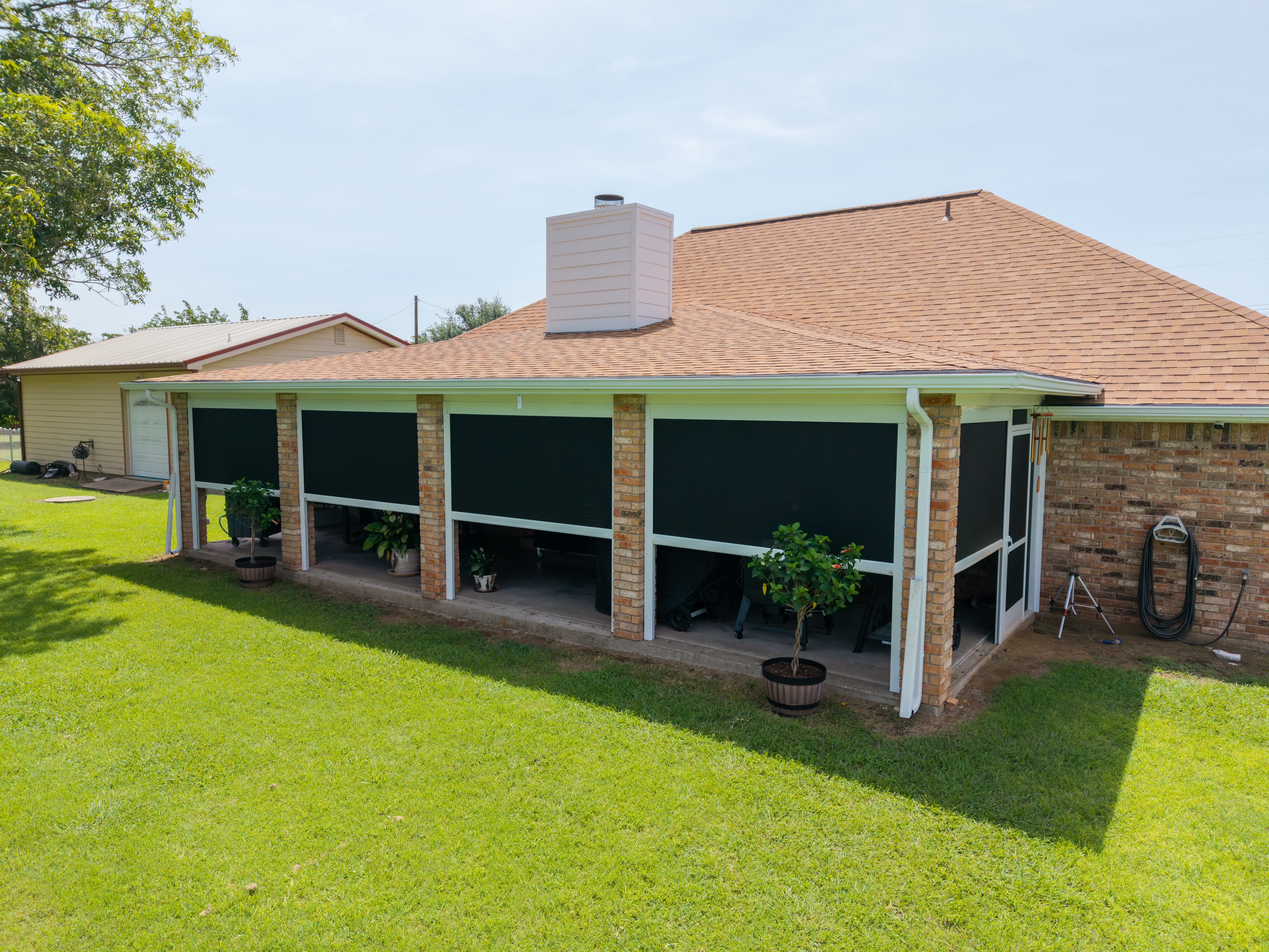 Screens-Residential-Patio-Black-RedBrick-AerialView